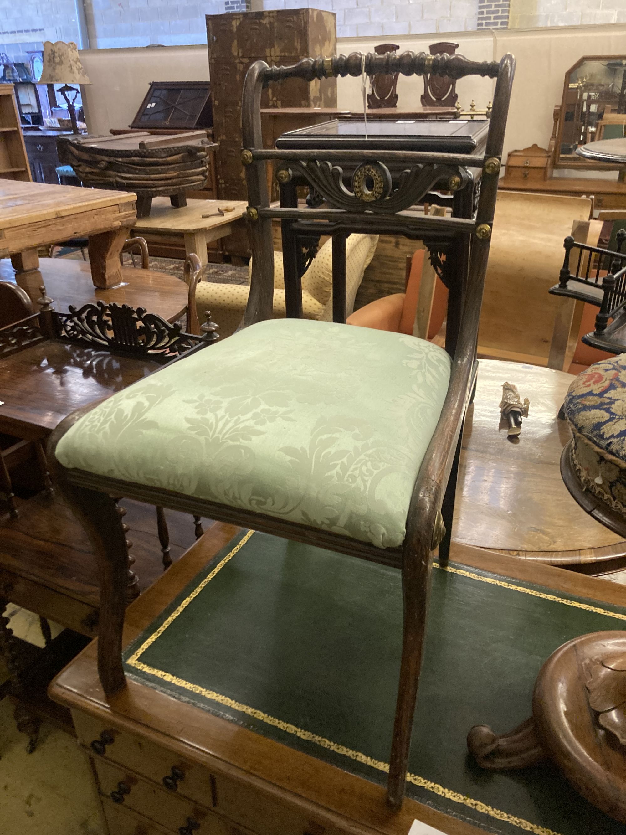 A Regency simulated rosewood dining chair and an early Victorian rosewood piano stool